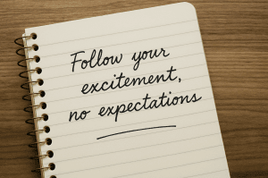 notebook page saying follow your excitement, no expectations